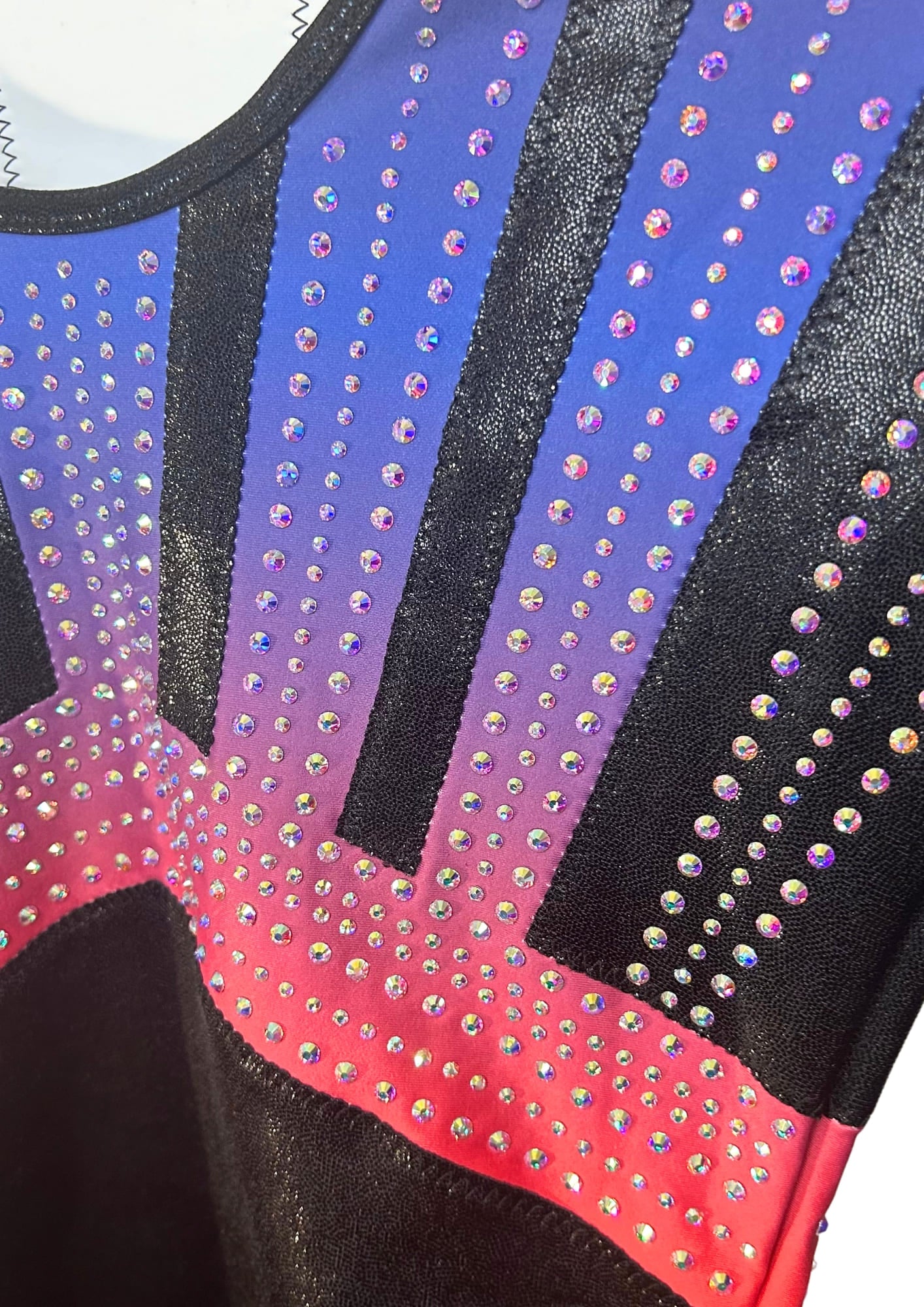 custom leotard, competition leotard, black leotard, blue leotard, long sleeve leotard, rhinestones, shiny leotard
