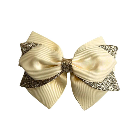 gymnastics bows, yellow bows, golden bows