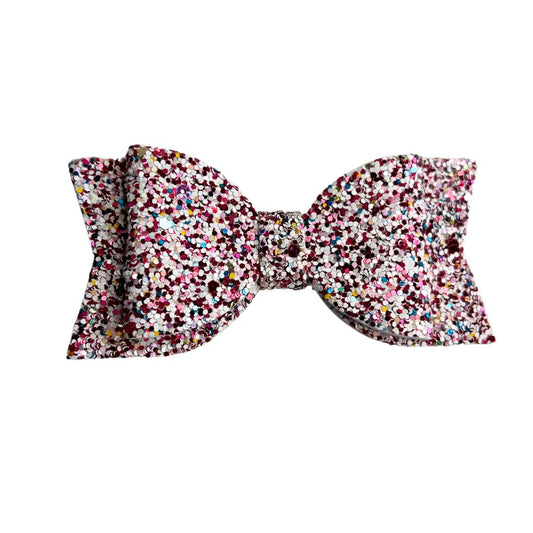 gymnastics bows, pink bows, shiny bows