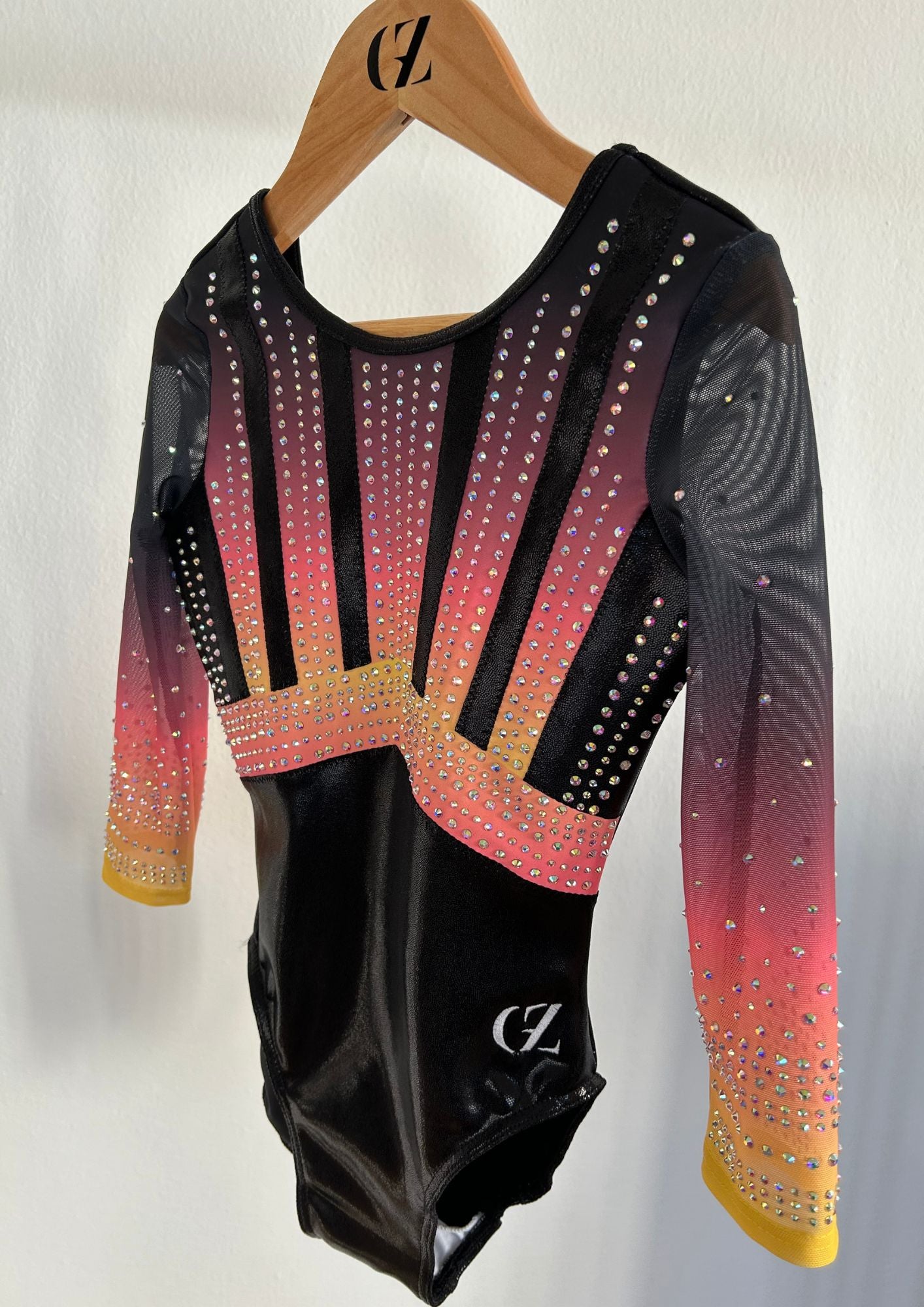 custom leotard, competition leotard, black leotard, pink leotard, long sleeve leotard, rhinestones, shiny leotard