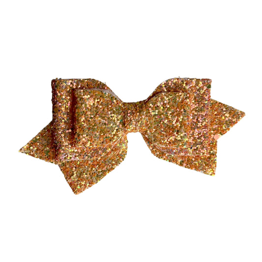 gymnastics bows, orange bows, shiny bows